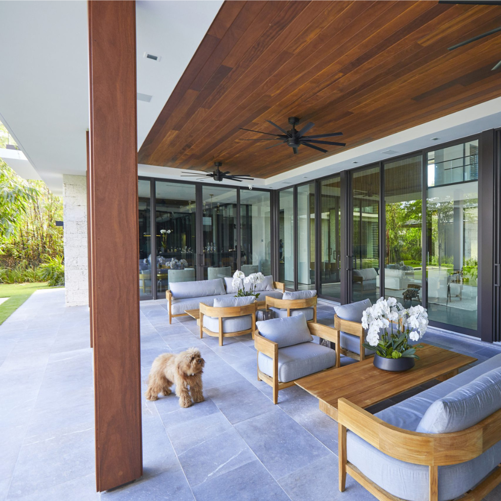 Cumaru wood ceiling in modern San Diego patio with outdoor seating and large glass doors